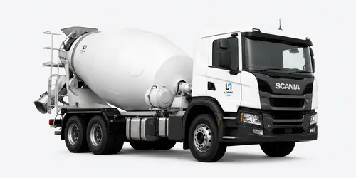 Concrete mixer truck delivering ready-mix concrete